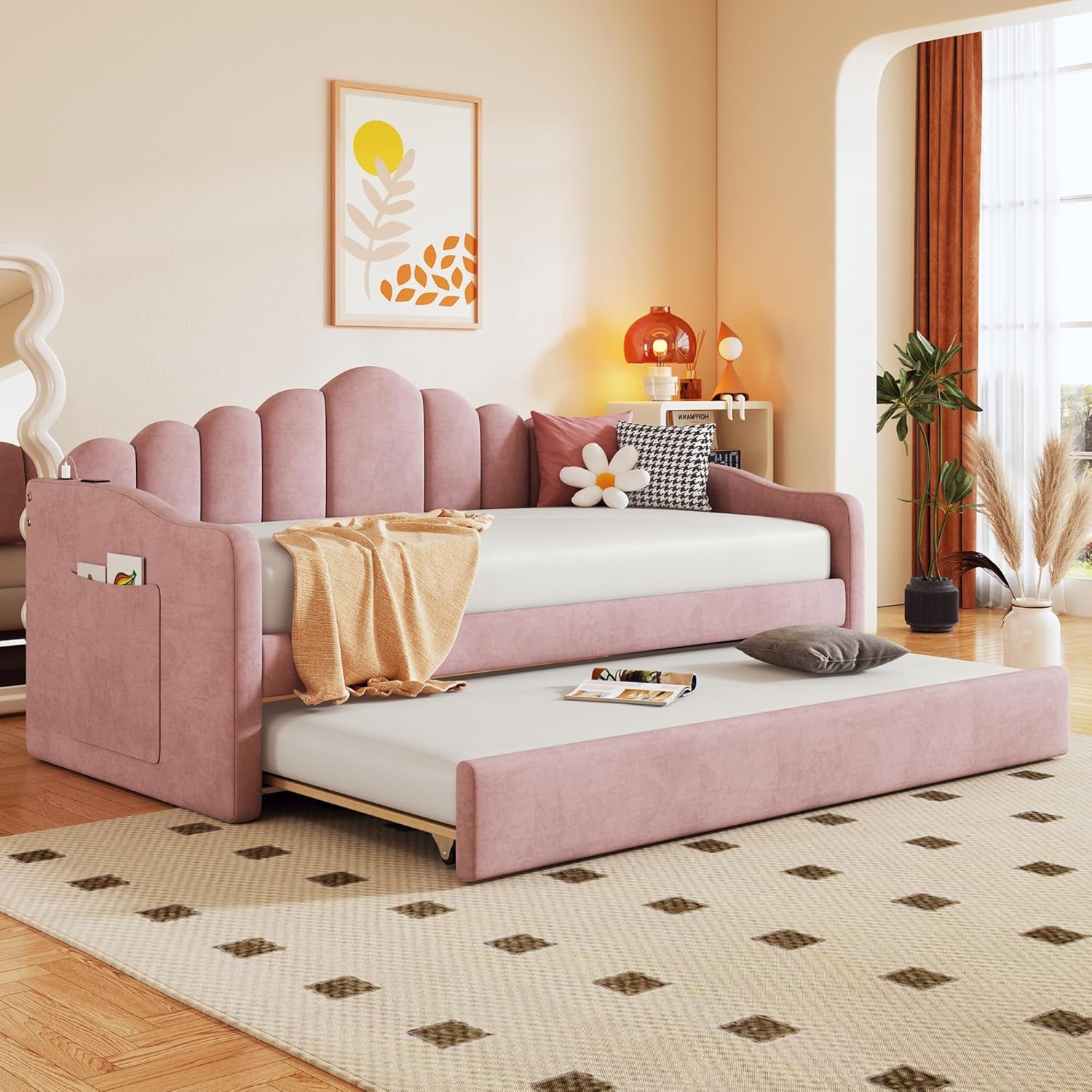 Pink sofa bed in a room
