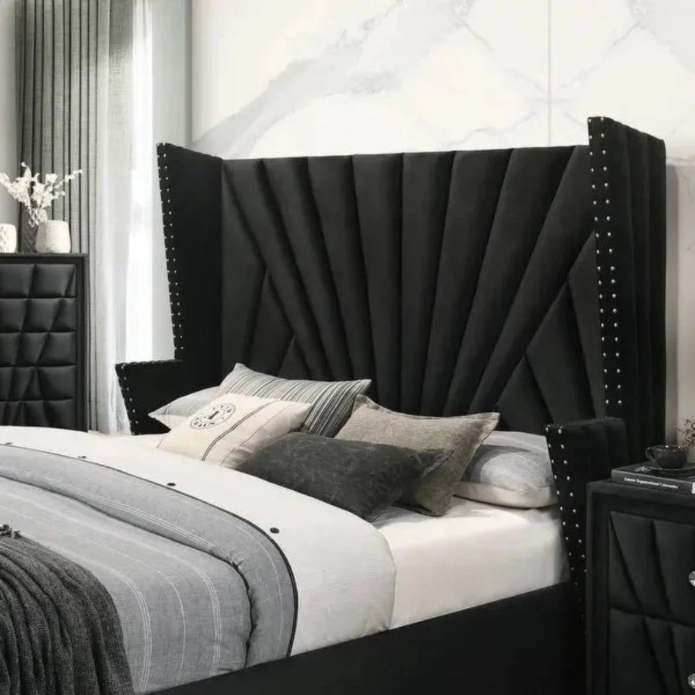 A bed with mattress black colour