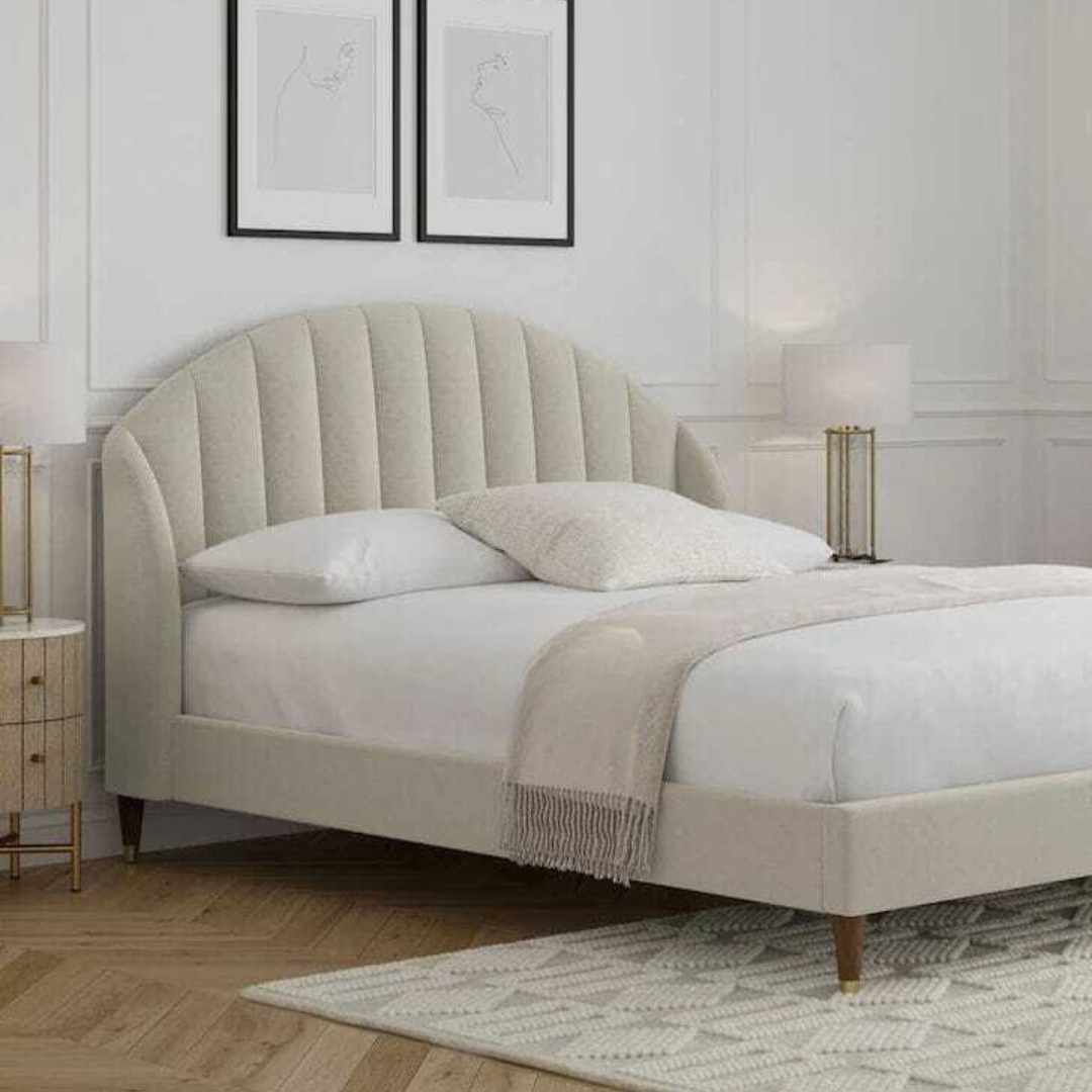 A bed with mattress light grey colour