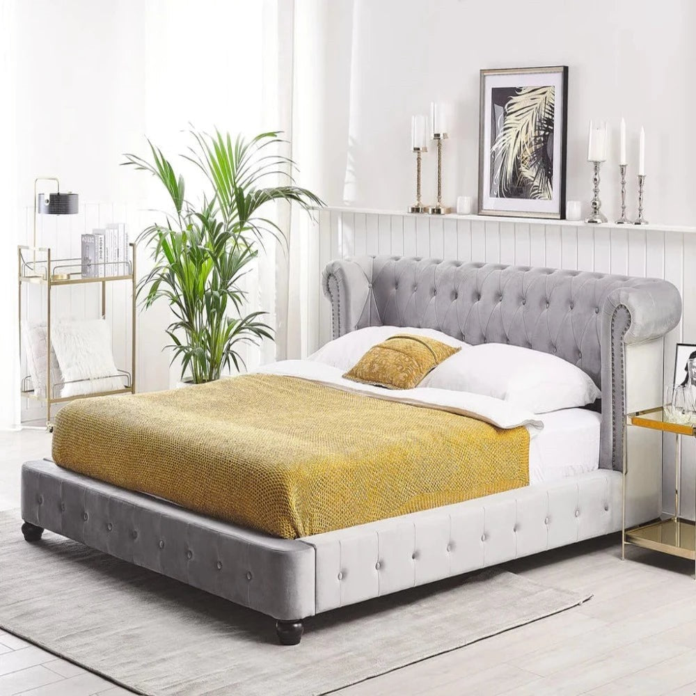 A bed with mattress grey colour 