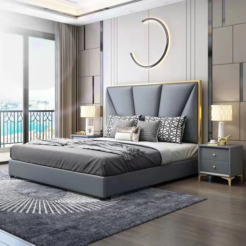 A bed with mattress grey colour