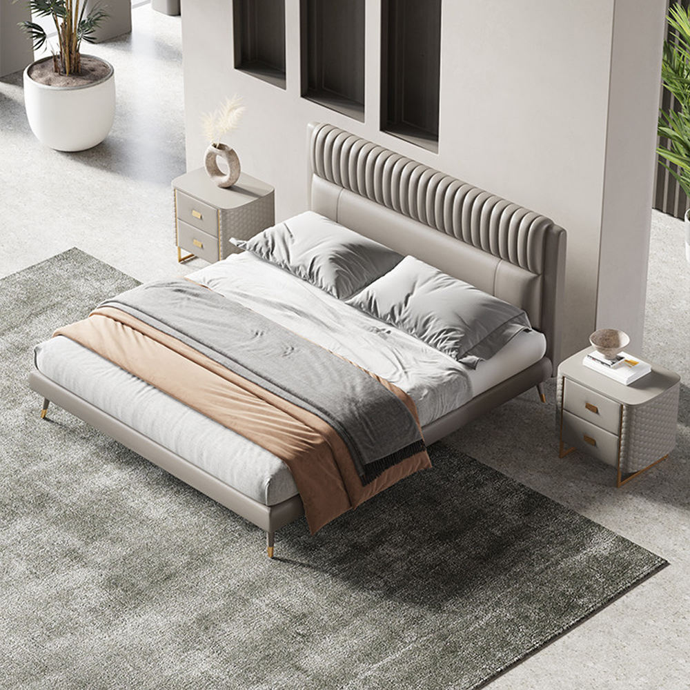Modern bedroom with a gray upholstered bed
