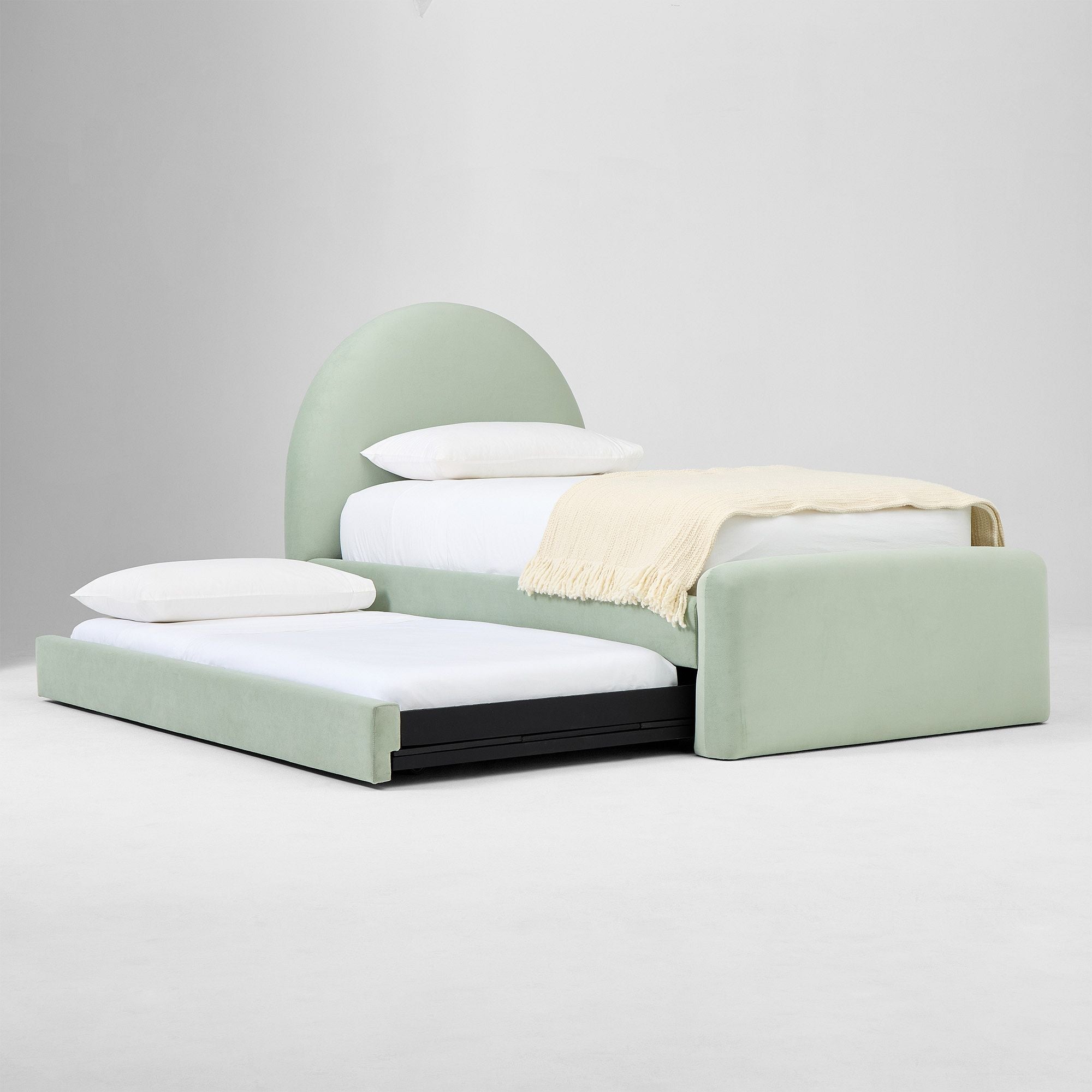 Light green upholstered bed