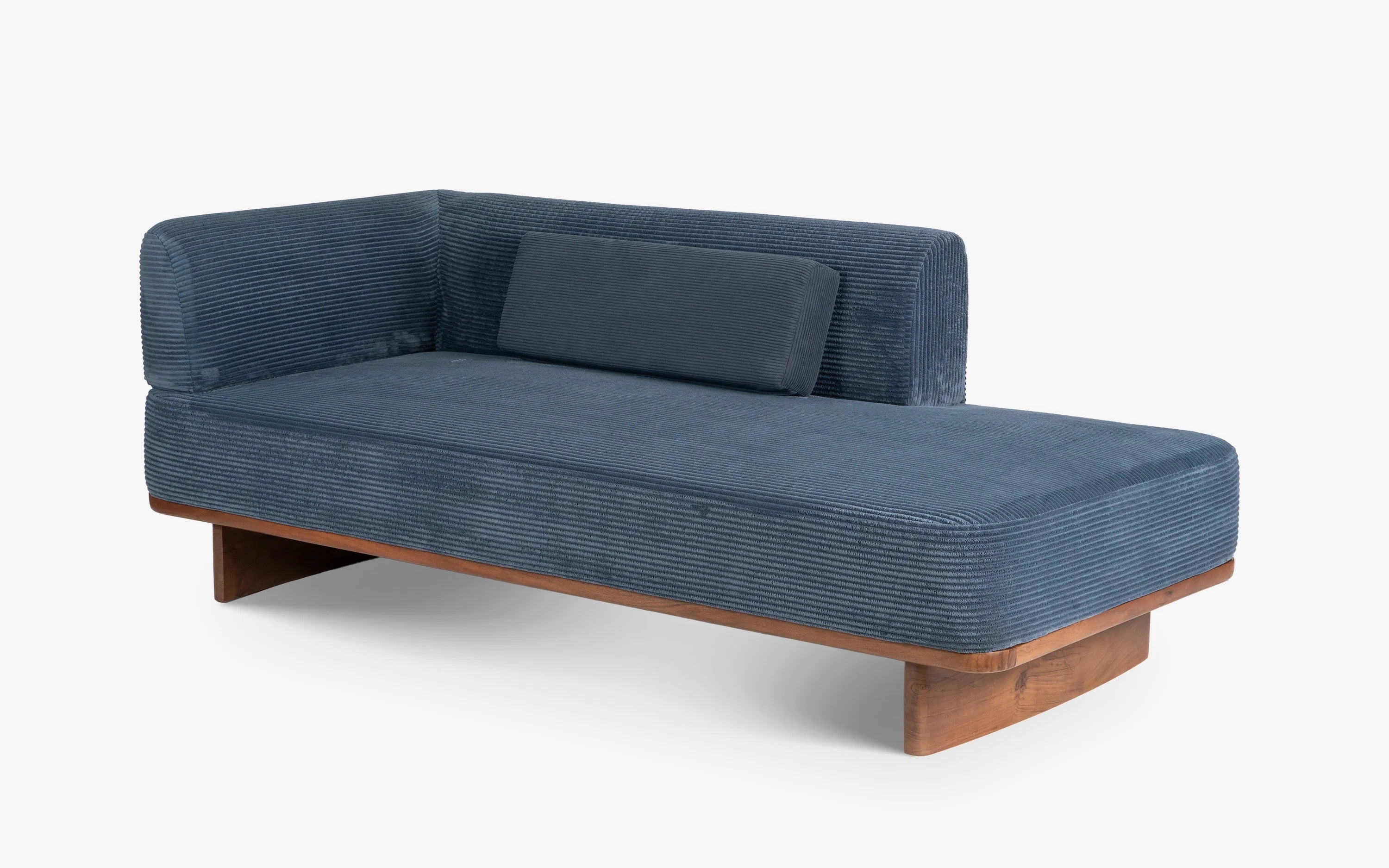 Blue corduroy upholstered daybed.