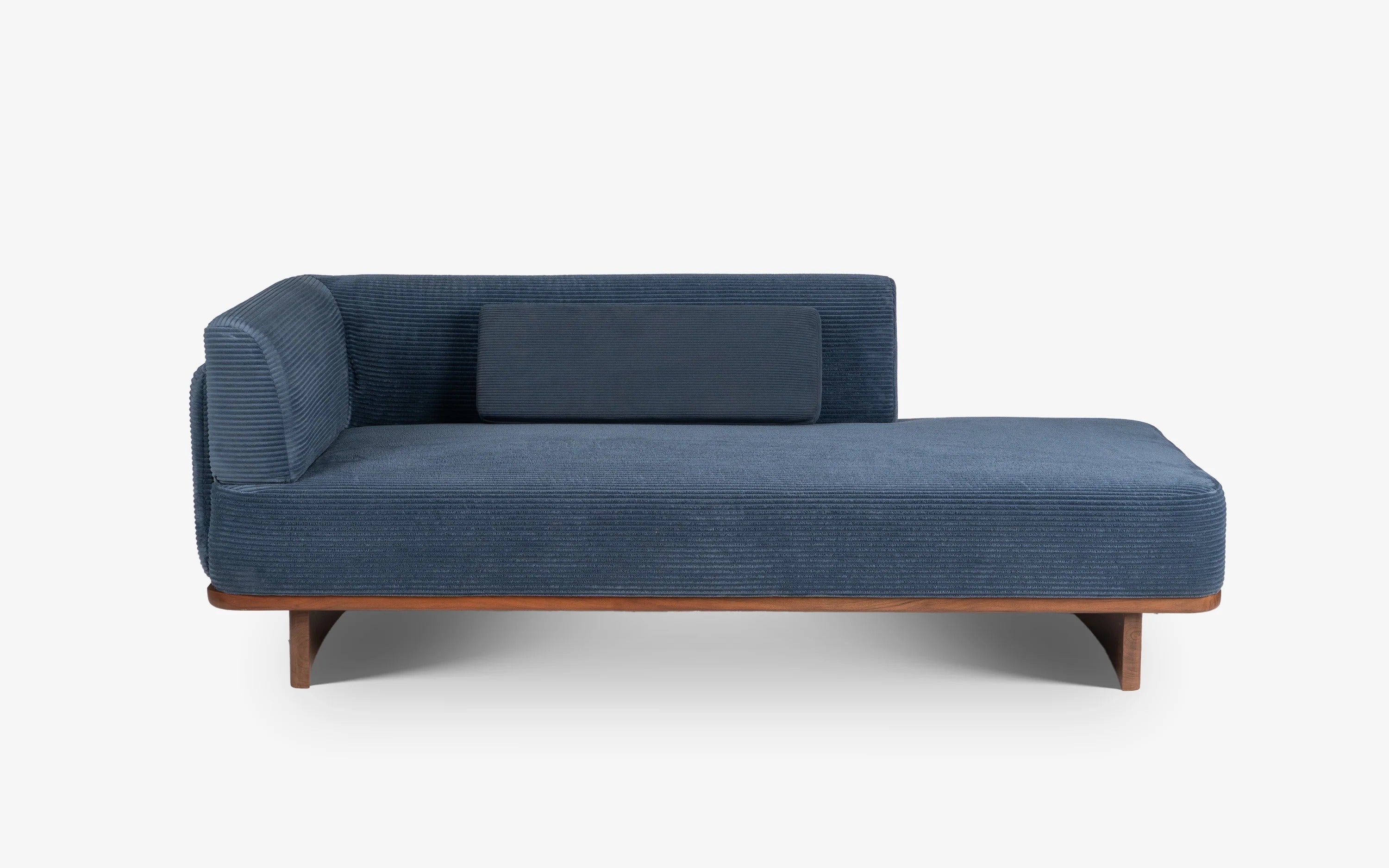 Blue corduroy upholstered daybed.