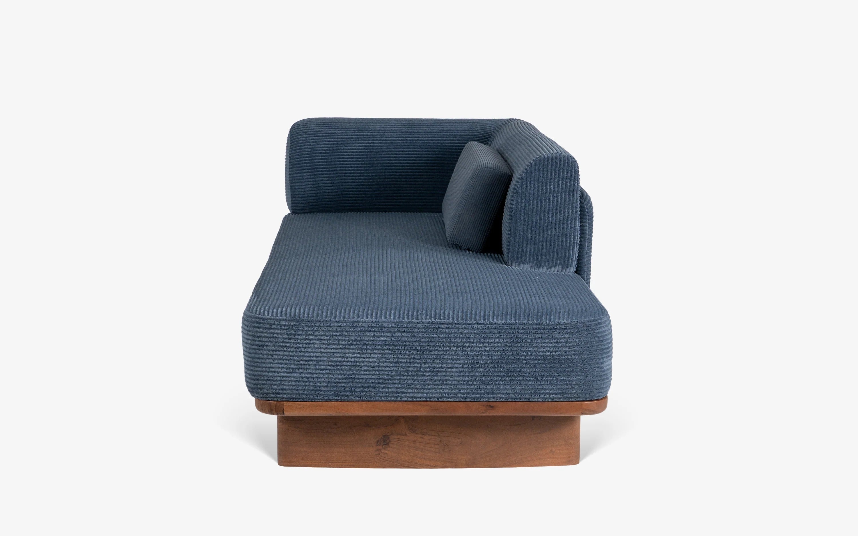 Blue corduroy upholstered daybed.