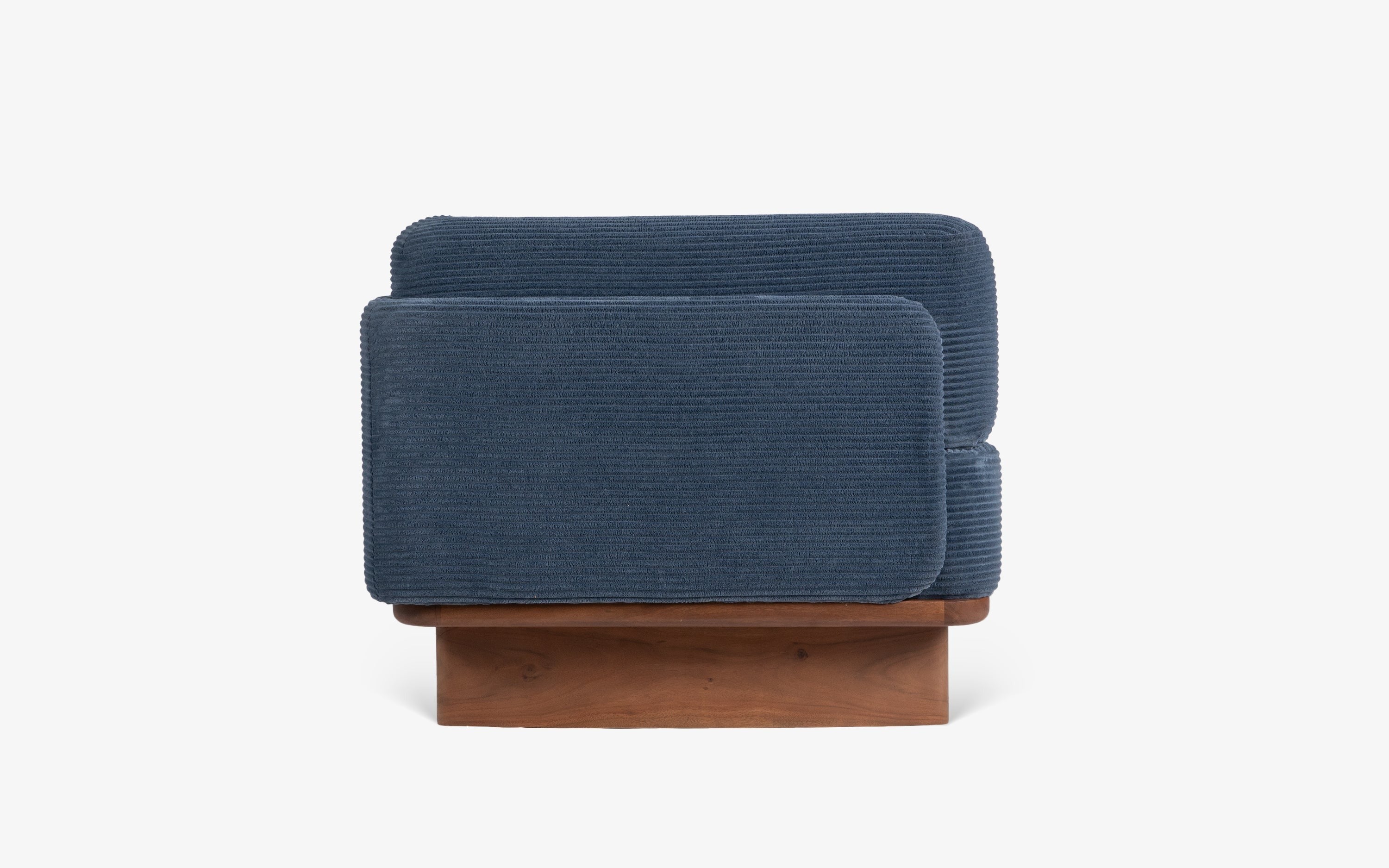 Blue corduroy upholstered daybed.
