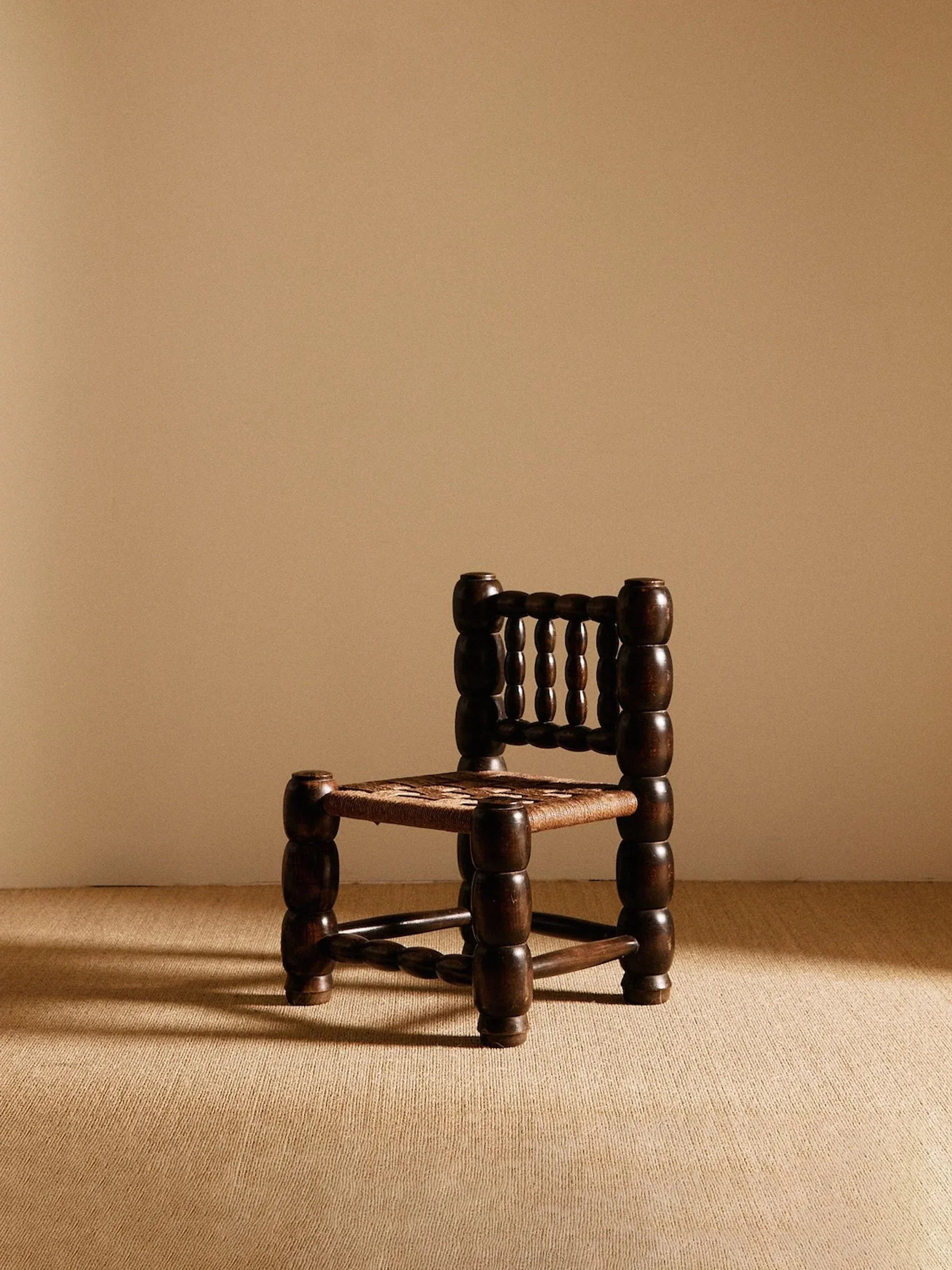 Sculpted chocolate-brown accent chair