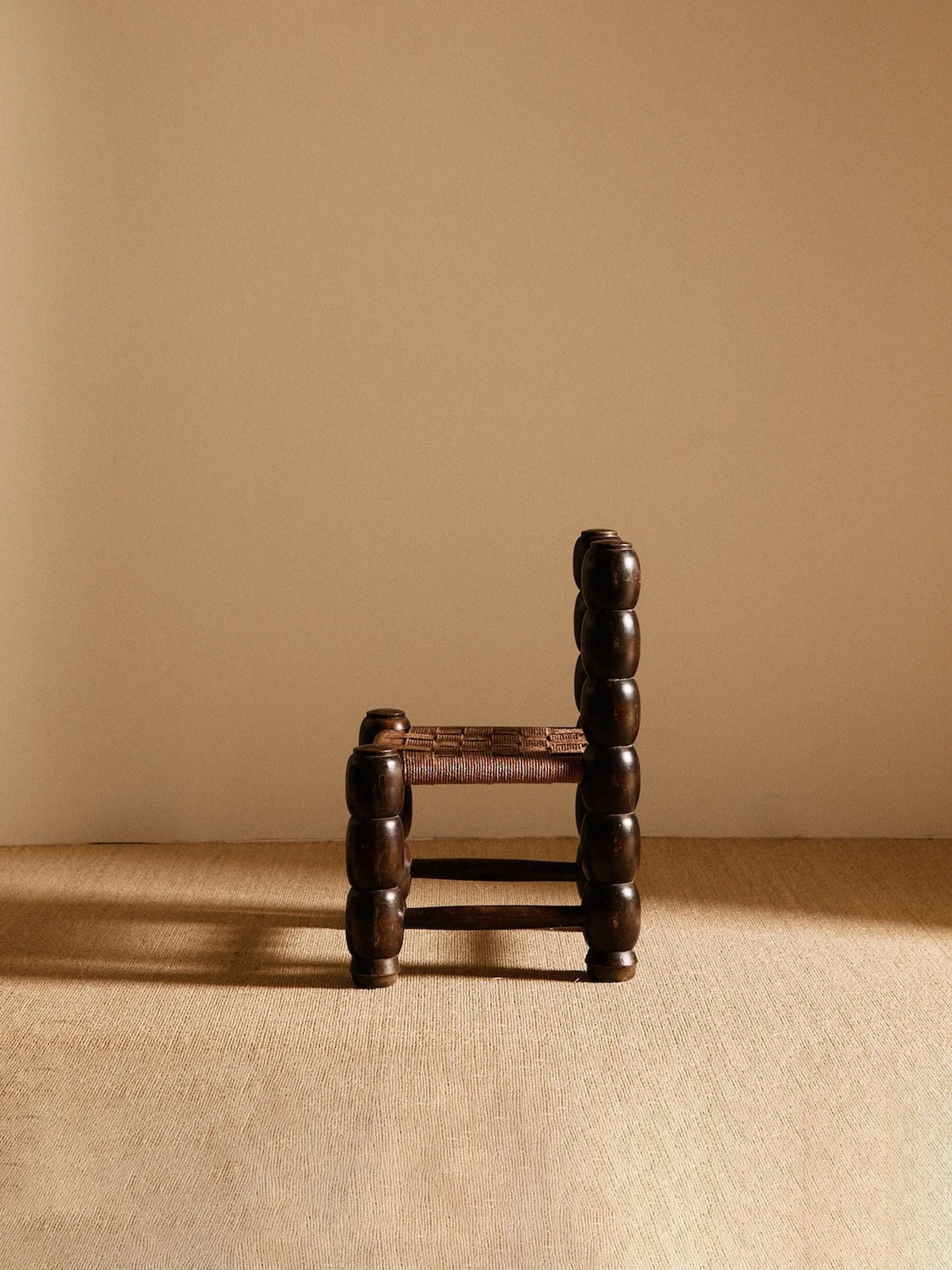 Sculpted chocolate-brown accent chair