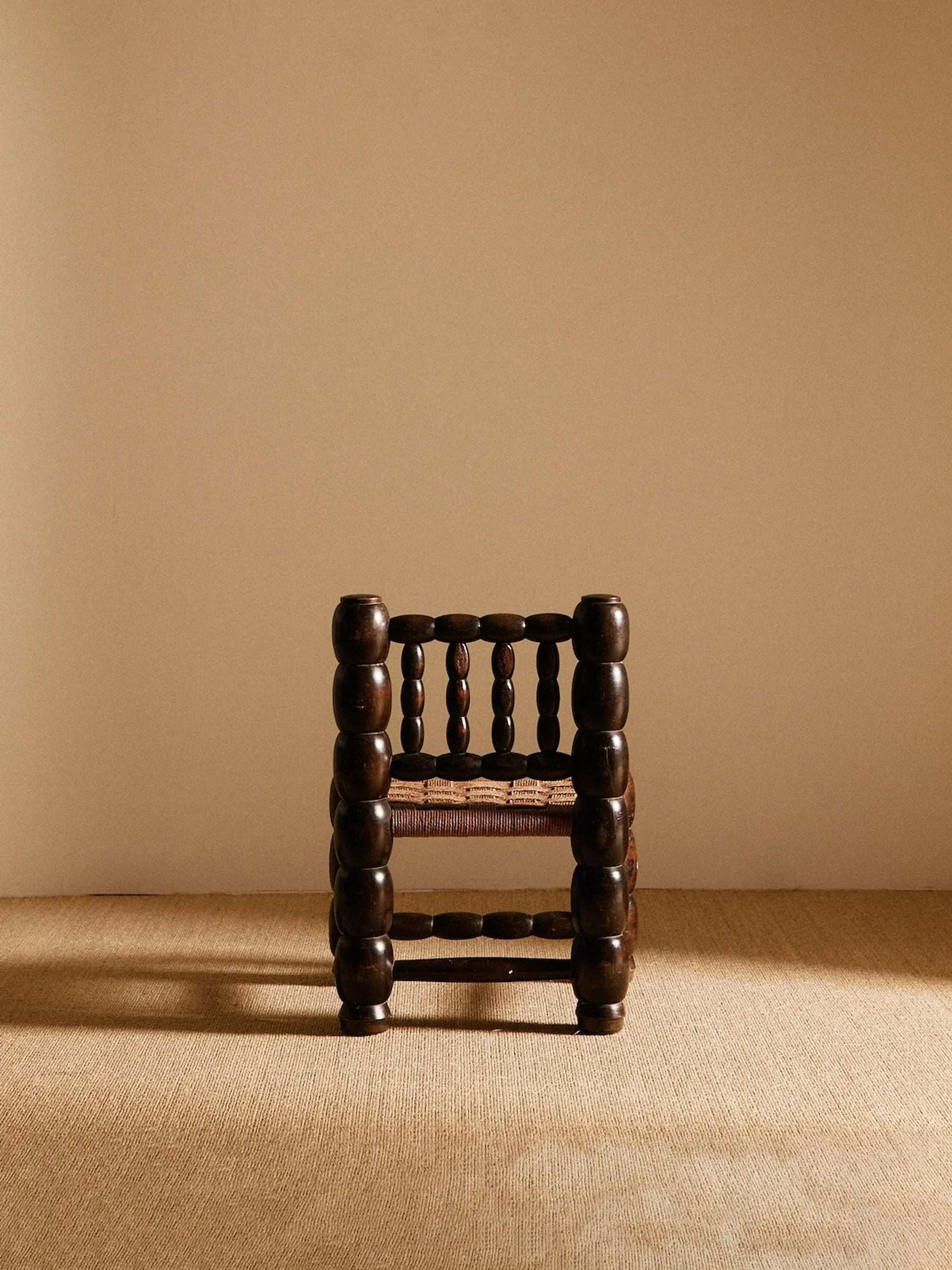 Sculpted chocolate-brown accent chair